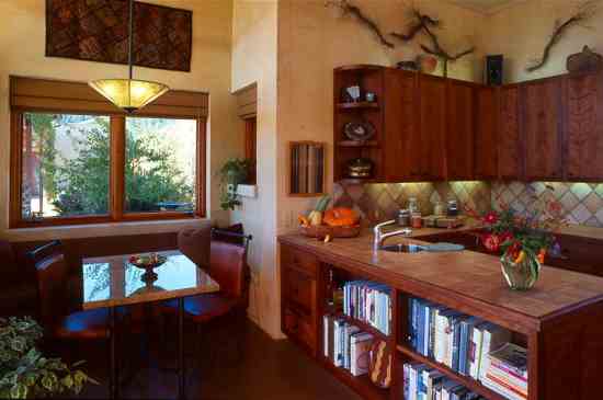 Mark and Karen, both serious cooks, love the kitchen’s ample counter space, cookbook storage and built-in banquette.